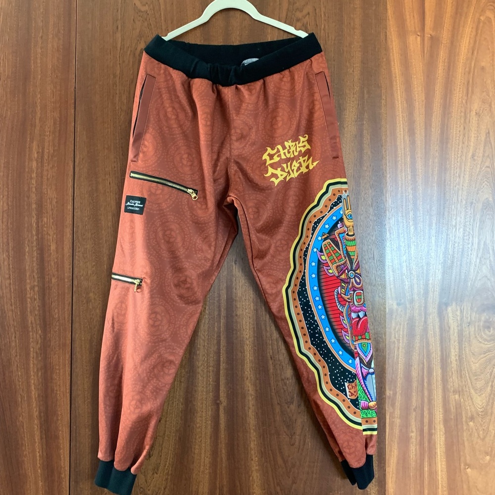 Nomadic Movement limited edition joggers by Chris Dyer